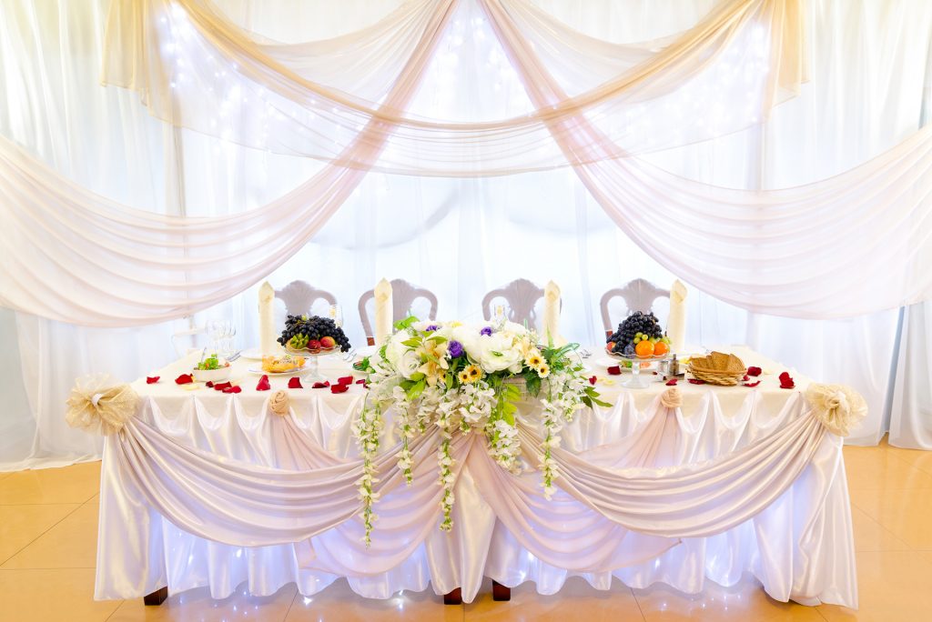 a laid wedding banquet table at a restaurant